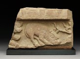 Fragment of a coping stone with horned mythical creature