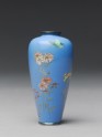 Vase with chrysanthemums and a butterfly