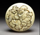 Manjū netsuke depicting the gods Daikoku and Ebisu dressed as manzai dancers