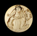 Manjū netsuke depicting a boy throwing beans at the Setsubun festival