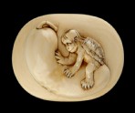 Manjū netsuke depicting a kappa sitting on a cucumber (EA2001.55)