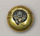 Manjū netsuke depicting Hotei peering from his sack