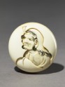 Manjū netsuke depicting Daruma playing the kamifuki game