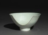 Bowl with high foot and incised floral decoration