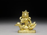 Figure of a bodhisattva seated on a bird
