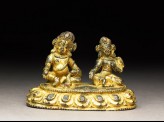 Figure of a male deity and his consort on a lotus-petalled throne