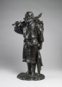 Figure of an Ainu fisherman with his catch