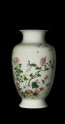 Vase with insects and flowers