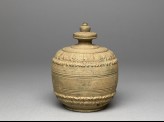 Lidded reliquary containing votive offerings