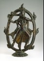 Figure of Devi dancing in a ring of fire