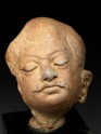 Head of a moustachioed man (EAOS.50)