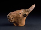 Terracotta head of an animal, possibly a bull