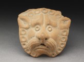 Lion mask from a vase