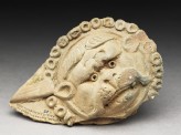Lion mask from a vase (EAX.68)