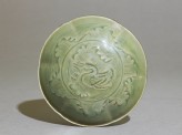 Greenware bowl with ducks amid waves