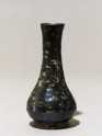 Black ware vase with yellow splashes (EAX.1572)