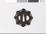 Tsuba in the form of a stylized flower