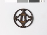 Round tsuba with voluted points
