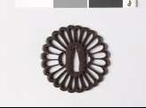 Tsuba in the form of a chrysanthemum