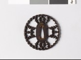 Round tsuba with myōga, or ginger shoots, and karigane, or flying geese (EAX.10049)