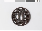 Round tsuba with plum and cherry blossoms (EAX.10055)