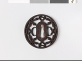 Round tsuba with flowers and yin-yang symbols