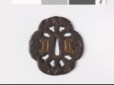 Mokkō-shaped tsuba with decorative plugs