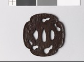 Mokkō-shaped tsuba with five gourds in negative silhouette
