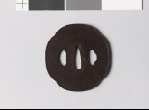 Mokkō-shaped tsuba with raised edge