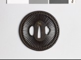 Round tsuba with chrysanthemum florets (EAX.10102)