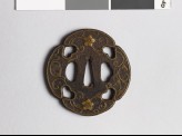 Mokkō-shaped tsuba with karakusa, scrolling floral pattern