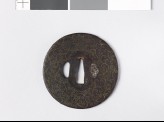 Round tsuba with scrolls and karigane, or flying geese