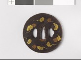 Round tsuba with clouds