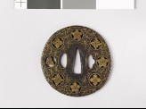 Round tsuba with flowers and water weeds
