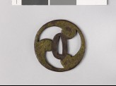 Tsuba in the form of a mitsudomoye, or three-comma shape