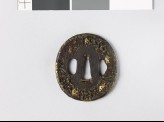 Tsuba with 'stick-lac' decoration and monkeys amid rocks