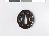 Mokkō-shaped tsuba with chrysanthemums and inome, or heart-shapes