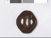 Tsuba with plum trees and flying birds