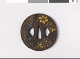 Lenticular tsuba with wood grain decoration and flowers (EAX.10240.a)