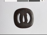 Lenticular tsuba with Amida-yasurime, or radial striations