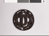 Tsuba with arrowhead leaves and flowers