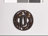 Tsuba with arrowhead leaves and flowers