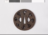 Tsuba with characters and flowers