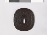 Tsuba with waves and cherry blossoms