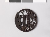 Tsuba with plum blossoms and kiri, or paulownia leaves