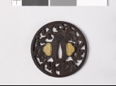 Round tsuba with peonies and a karakusa, or scrolling plant pattern (EAX.10390)