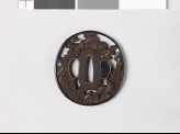 Tsuba with shishi, or lion dogs, among peonies and rocks