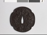 Mokkō-shaped tsuba with peony growing from a rock (EAX.10415)