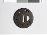 Tsuba with geese flying above reeds