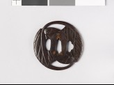 Round tsuba in the form of two aoi, or hollyhock leaves (EAX.10476)